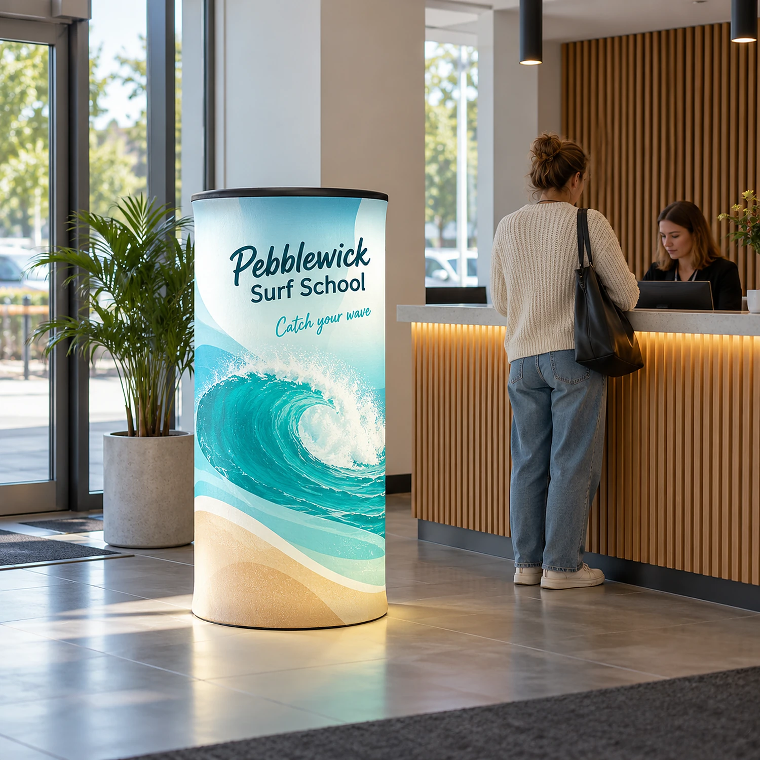 Air Inflatable Circular Tower in an office lobby, shown with an example design