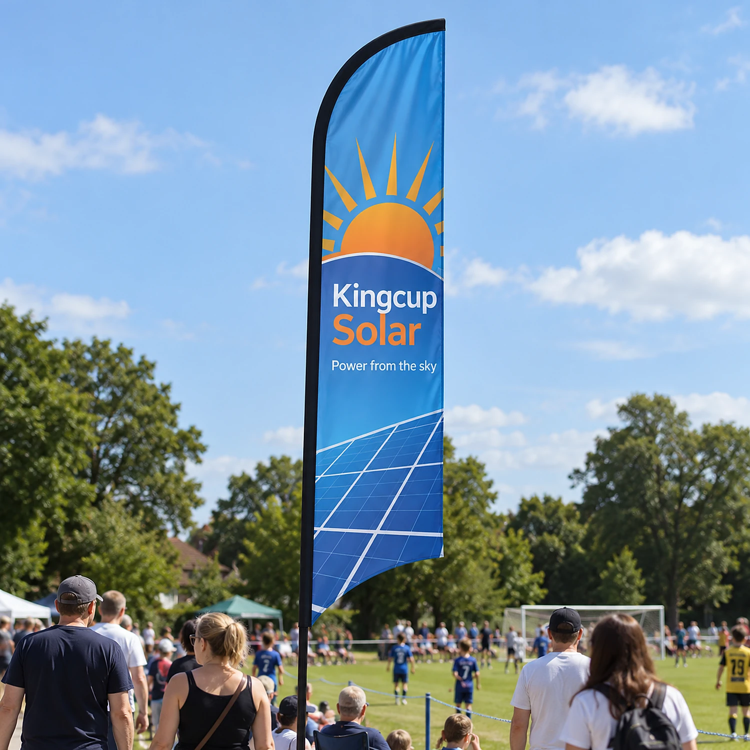 Blade Flag 14ft at a community sports day, shown with an example design