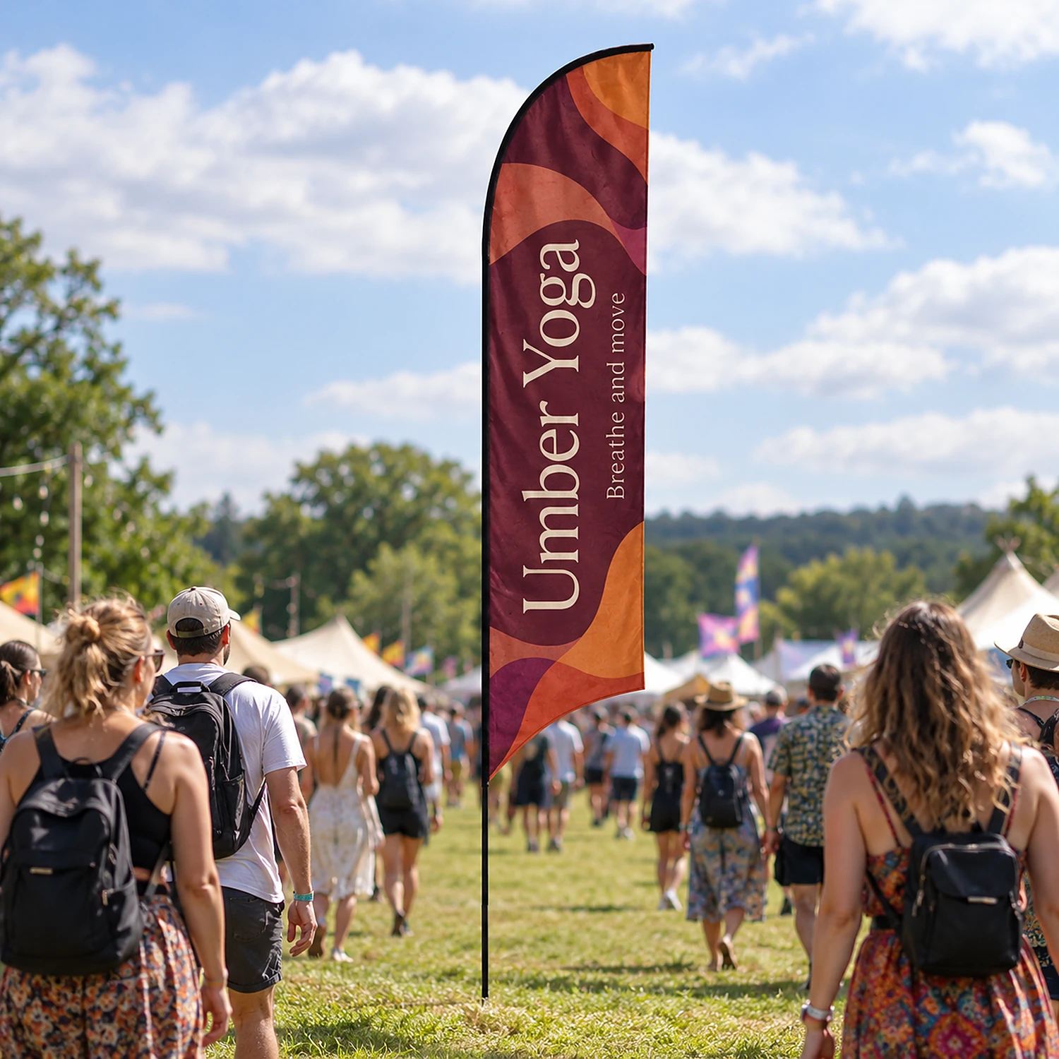 Curve fibreglass flag in use at a summer festival entrance