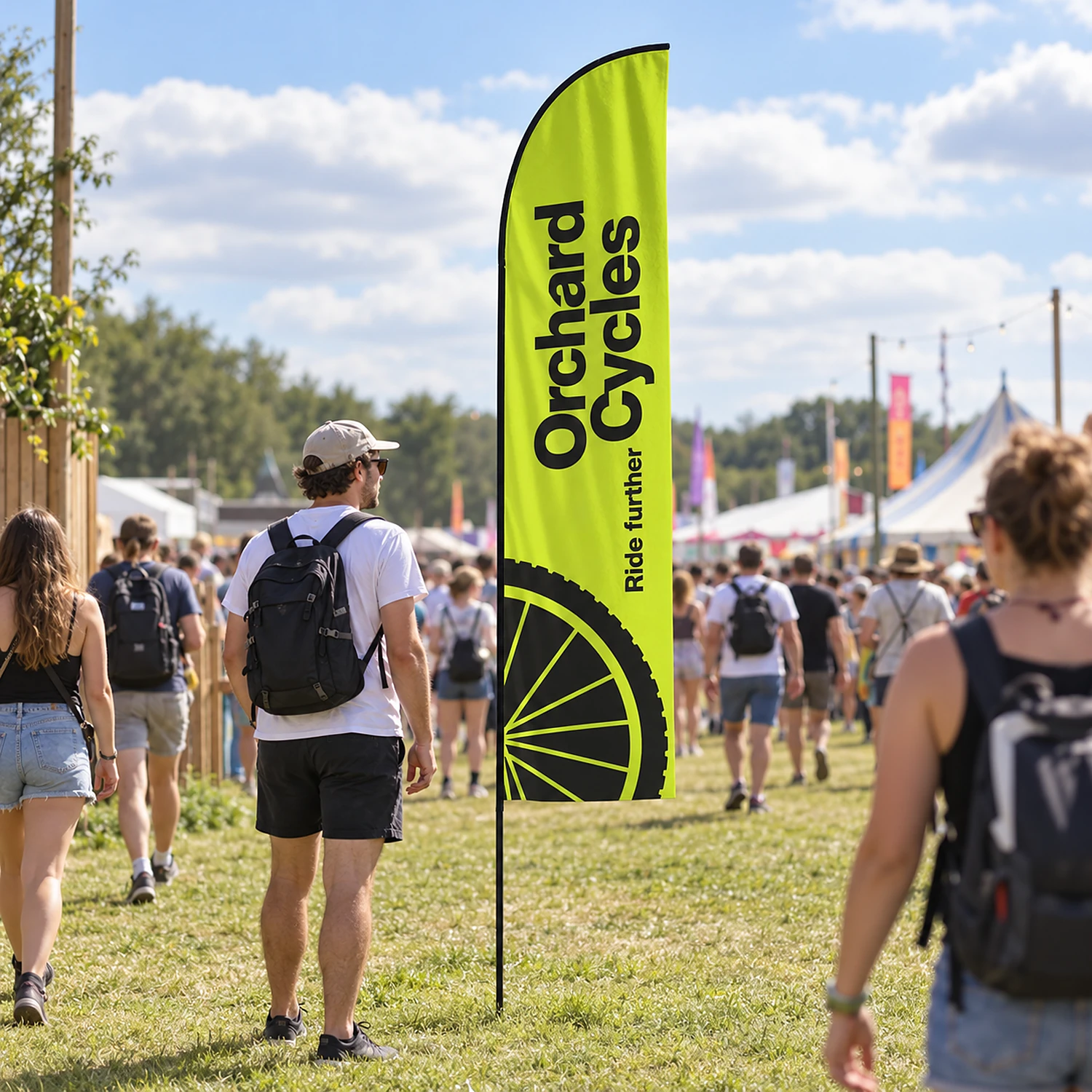 Feather fibreglass flag in use at a summer festival entrance