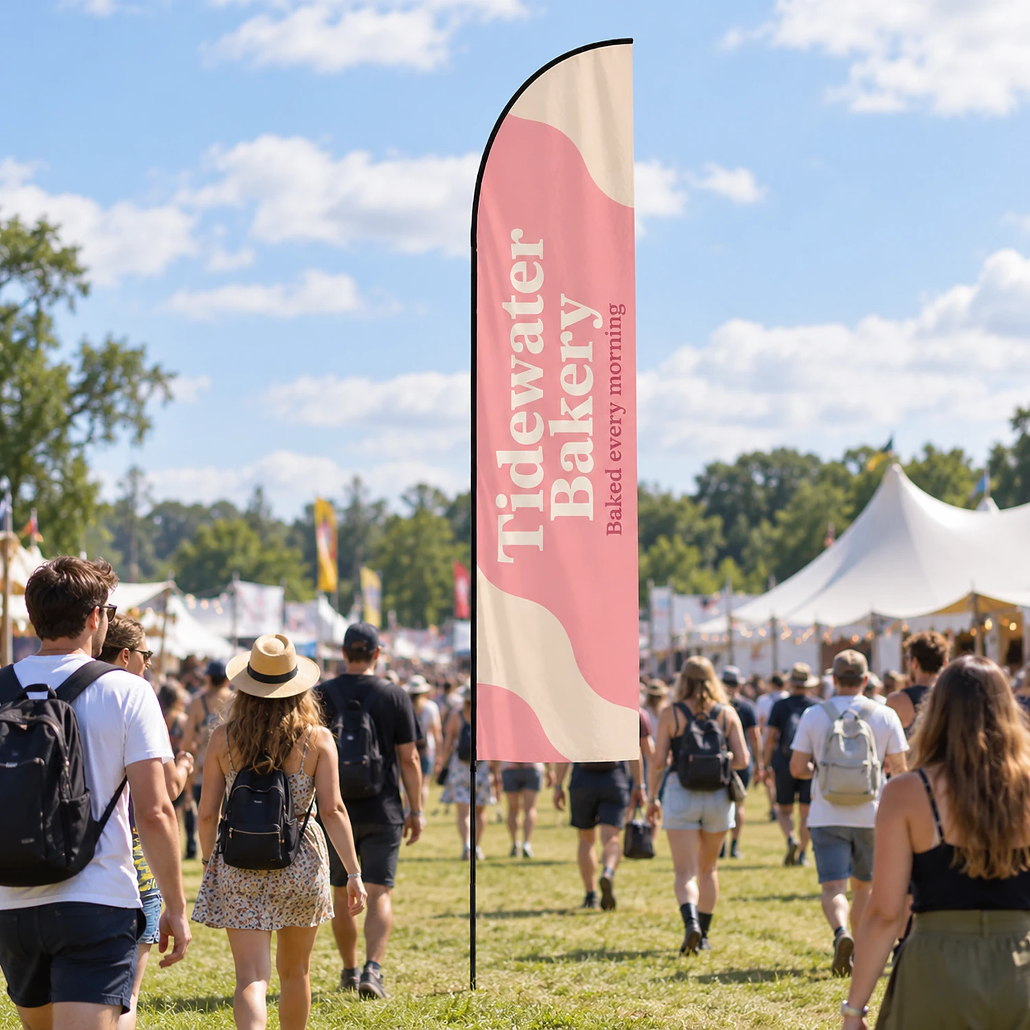 Feather fibreglass flag in use at a summer festival entrance