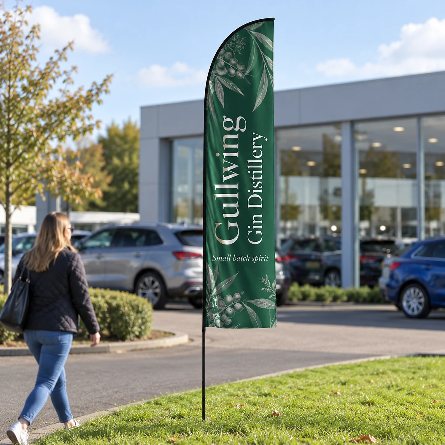 Feather fibreglass flag in use outside a car showroom