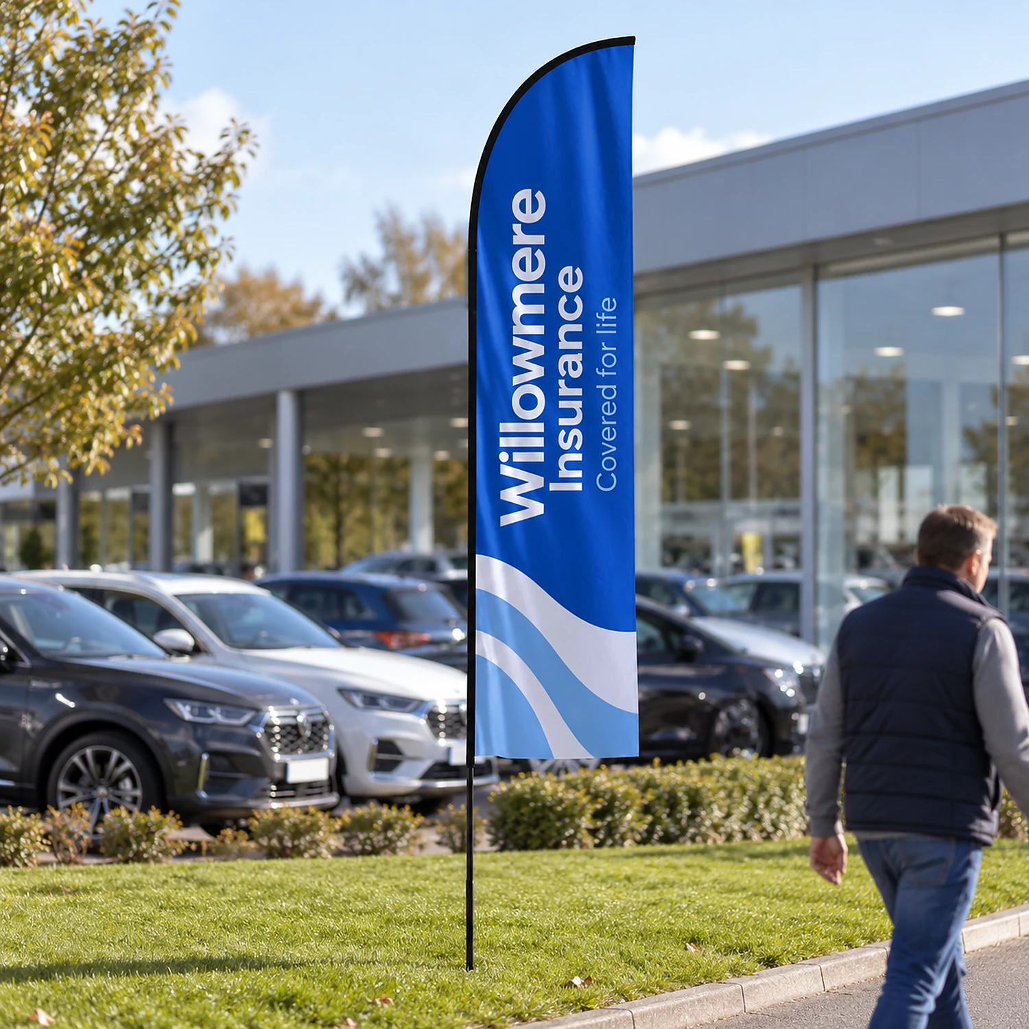 Feather fibreglass flag in use outside a car showroom
