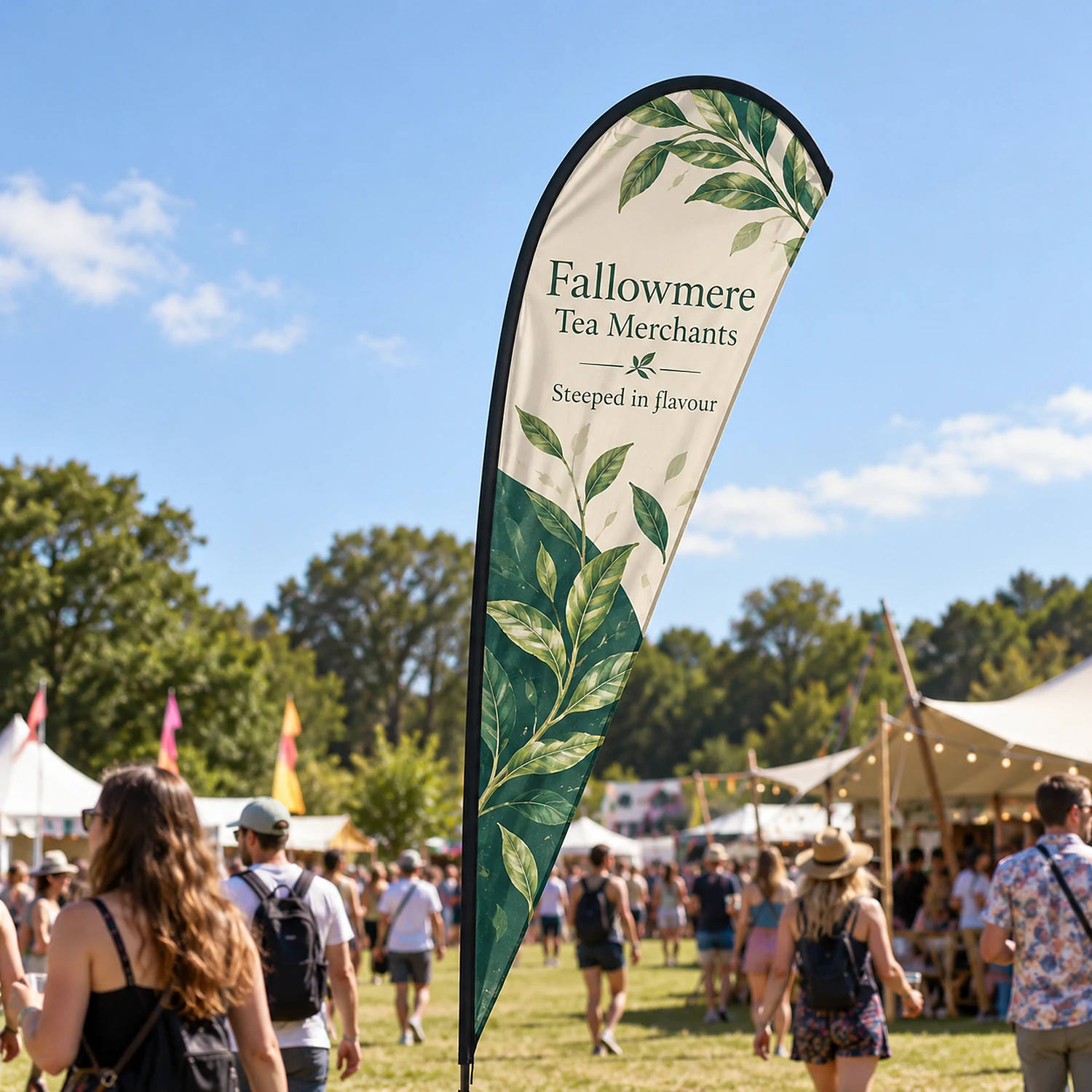 Feather Flag 10ft at an outdoor summer festival, shown with an example design