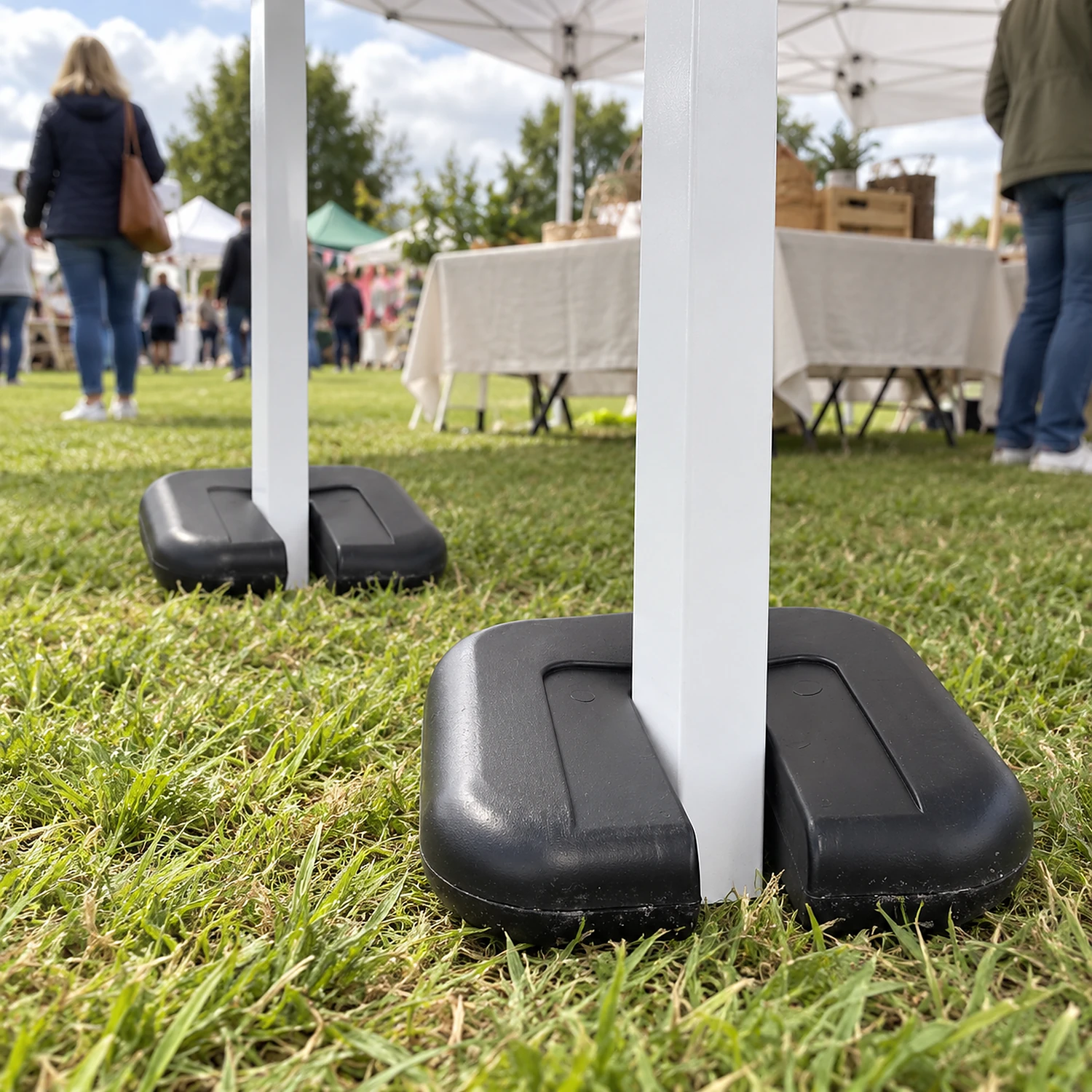 Gazebo leg weights on the legs of a pop-up gazebo