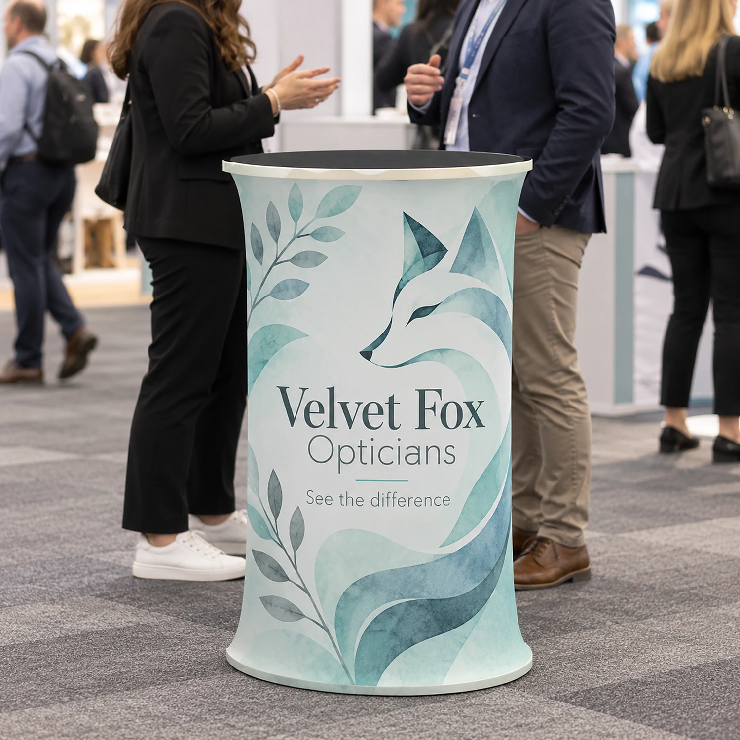 Oval fabric counter in use at a busy trade show