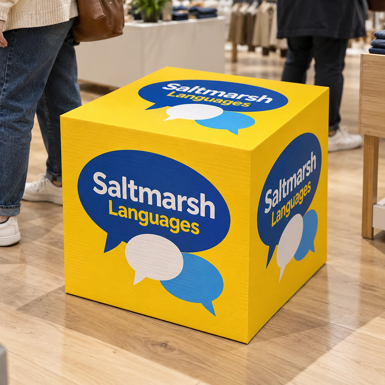 Printed cardboard display cube in a shop