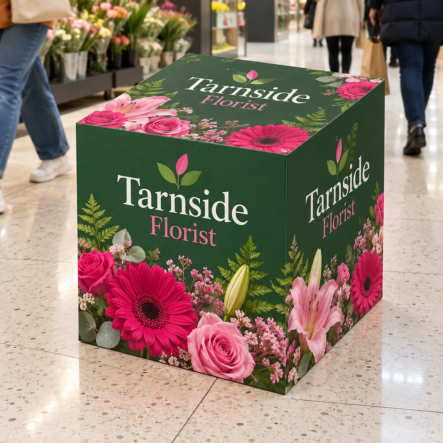 Printed cardboard display cube in a shopping centre