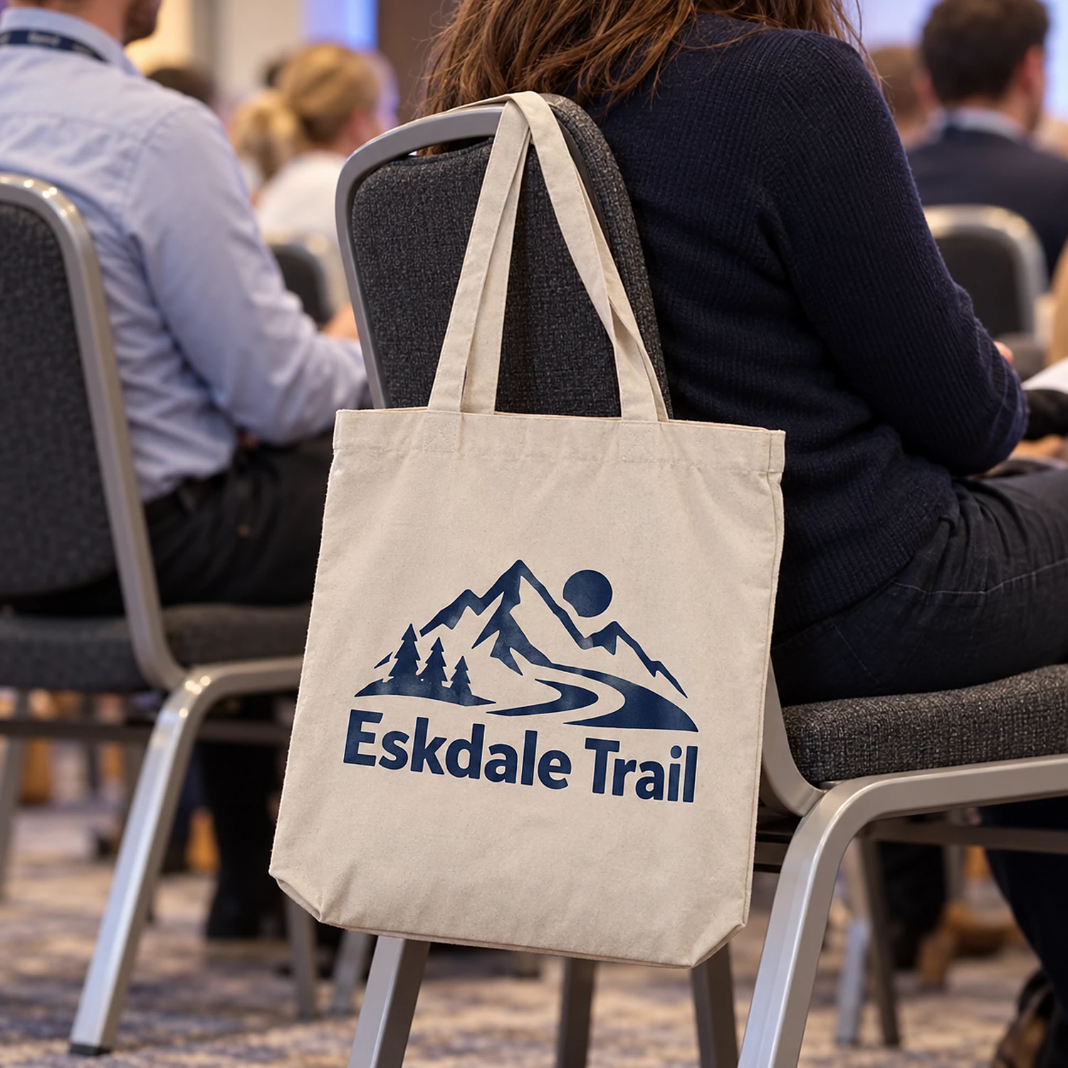 Printed cotton tote bag at a conference