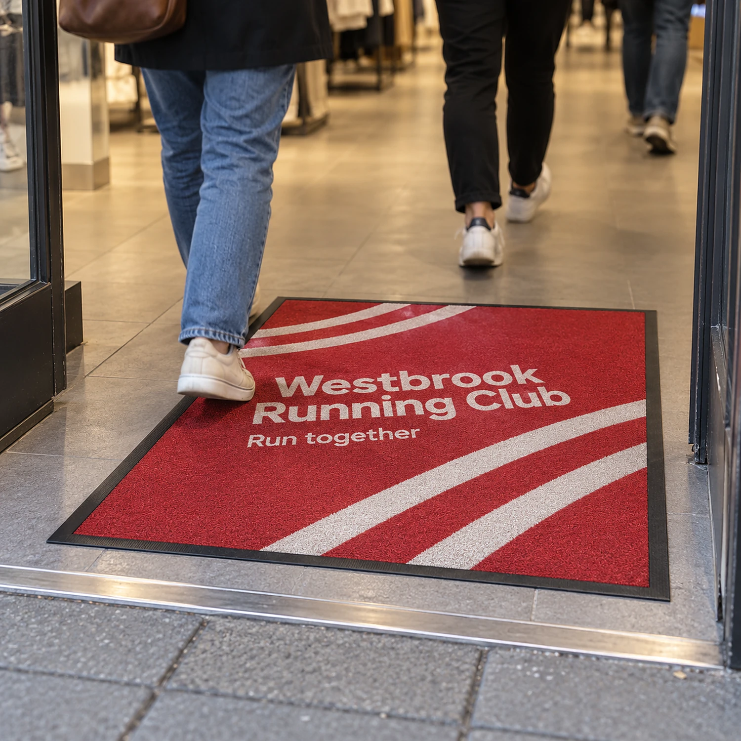 Printed floor mat at a shop entrance