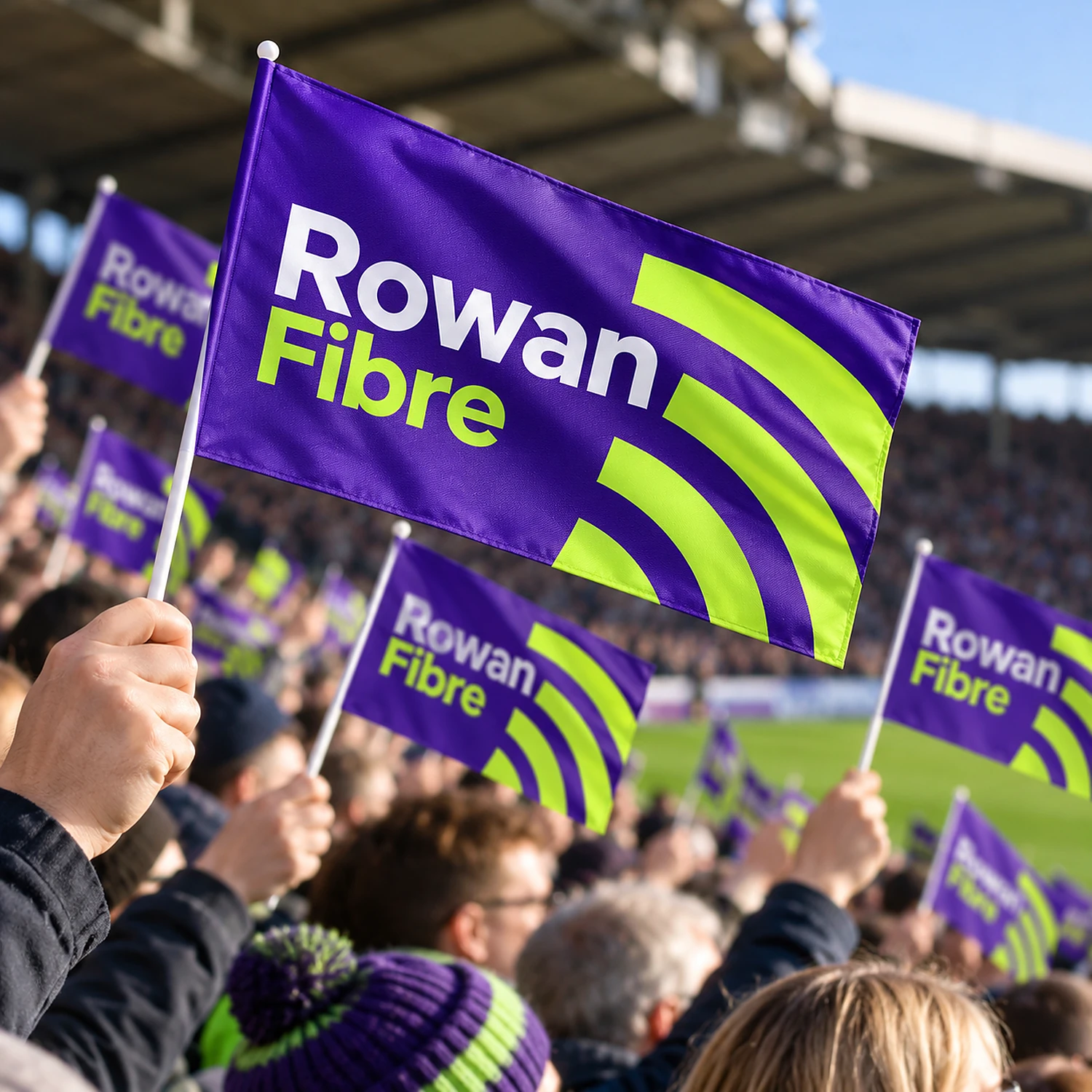 Printed handwaving flags held by fans at a sports ground