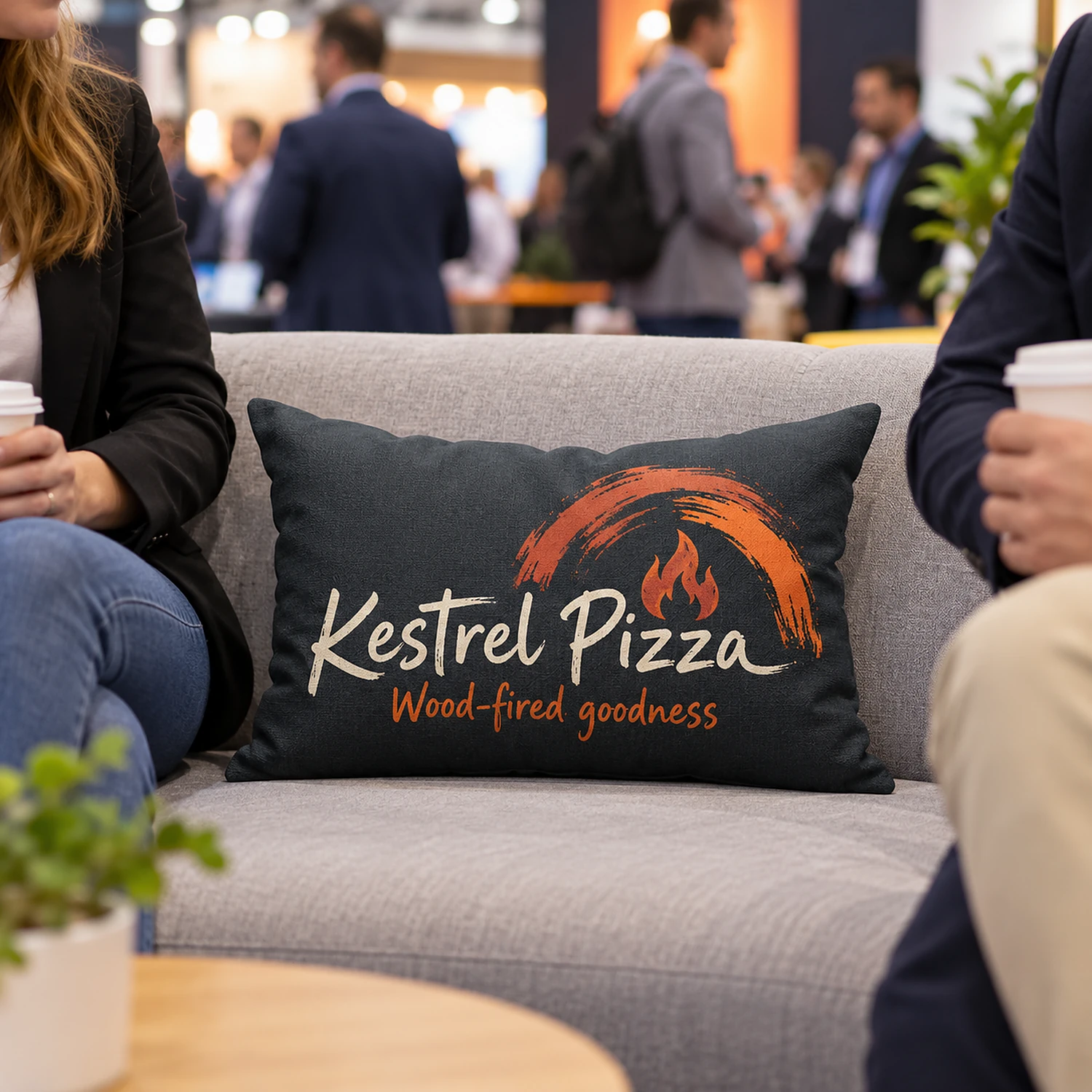 Printed lumbar cushion on seating in a trade show lounge