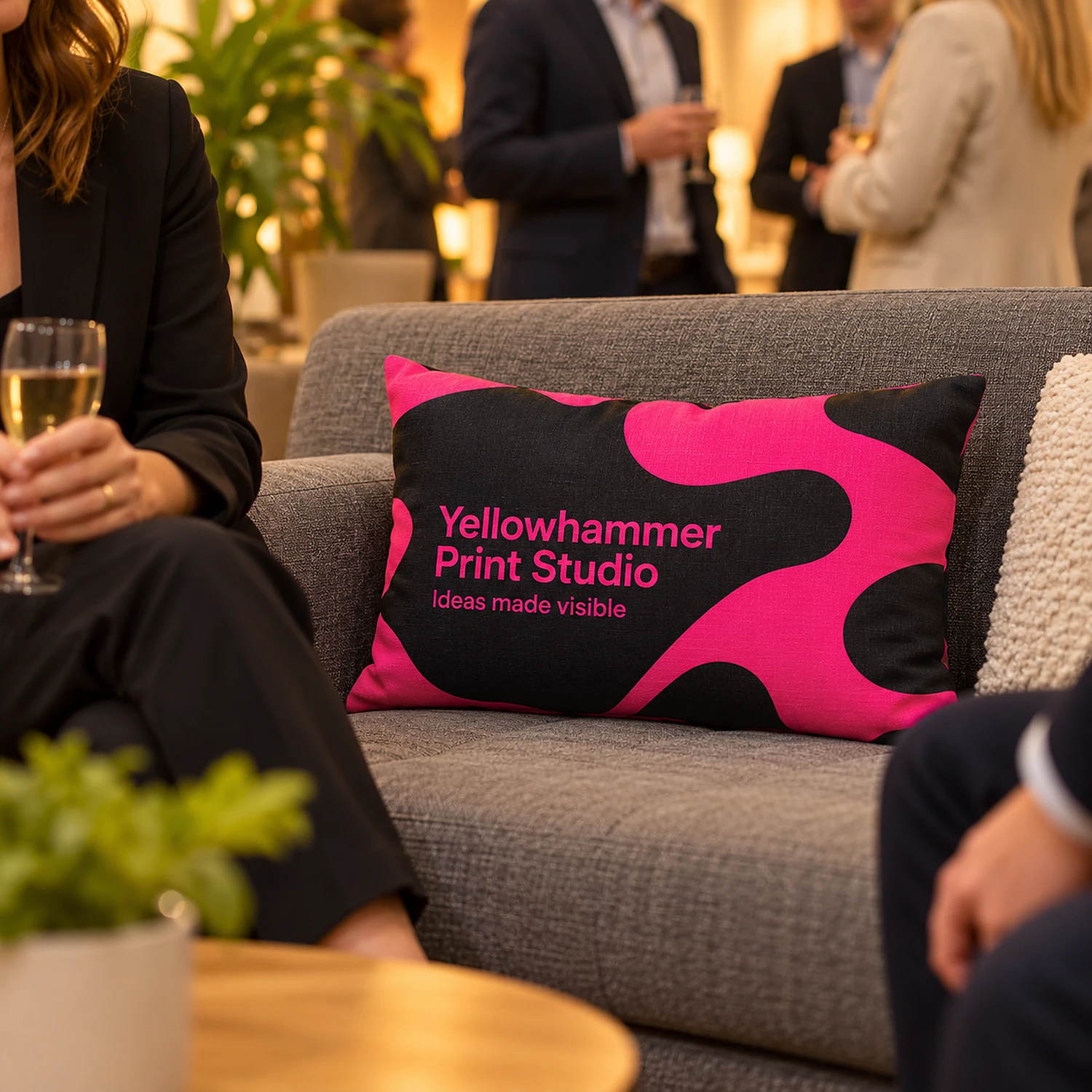 Printed lumbar cushion on a sofa in a corporate breakout lounge