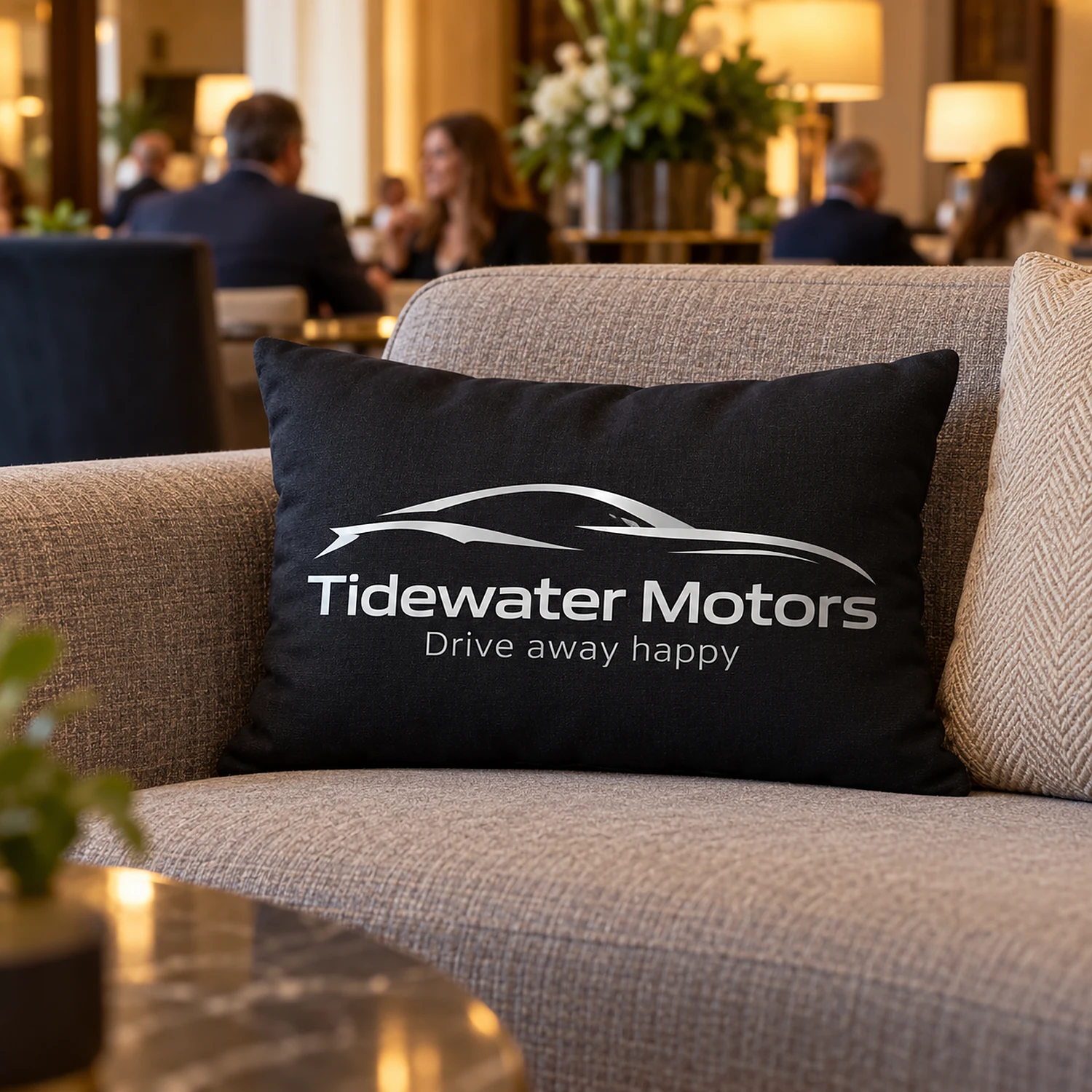 Printed lumbar cushion on a sofa in a hotel lobby