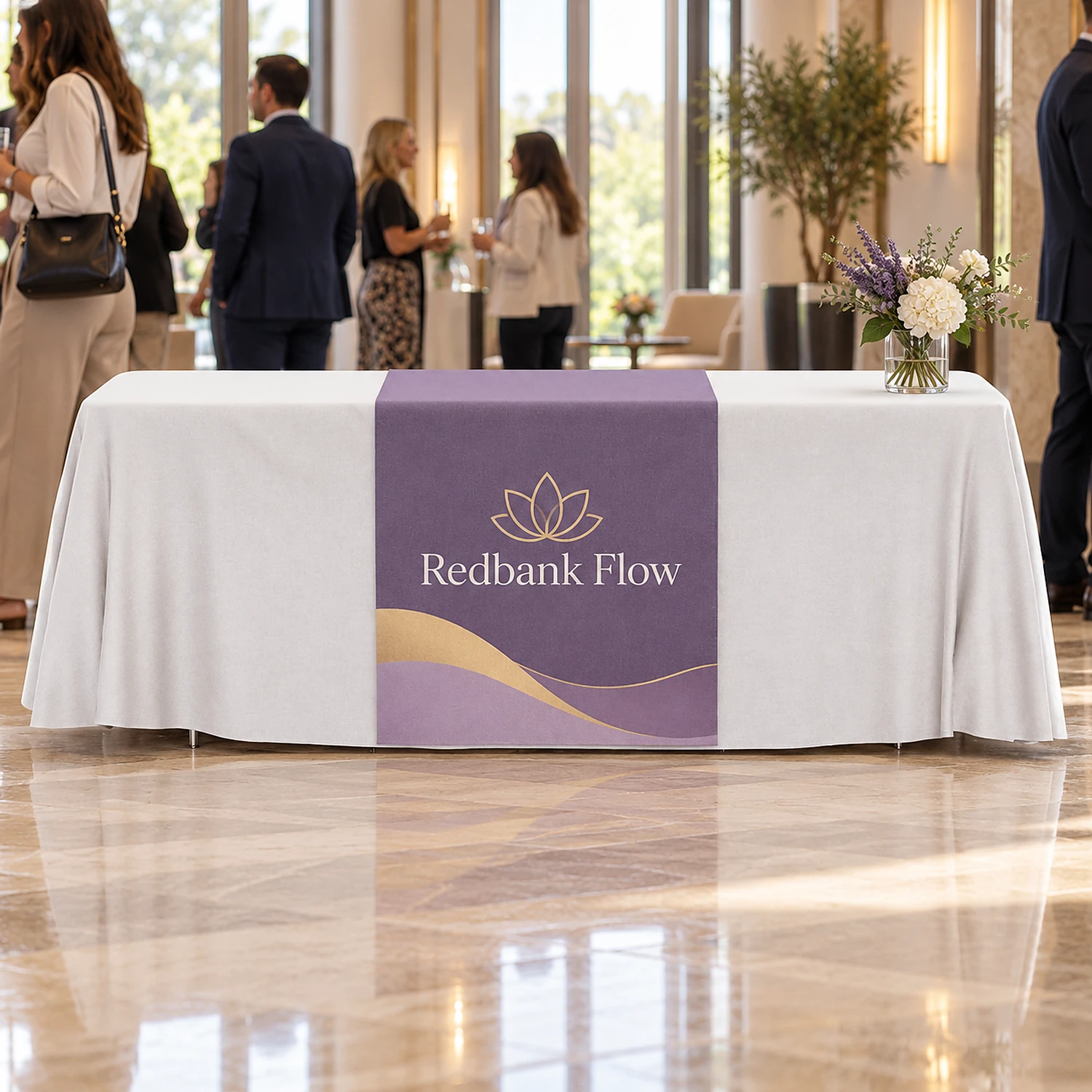 Printed table runner at a corporate event in a hotel foyer