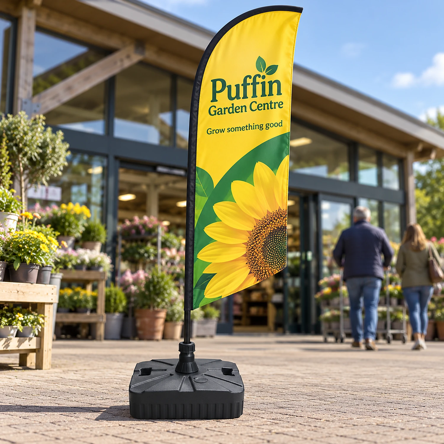 Small water sand base holding a flag on a business forecourt