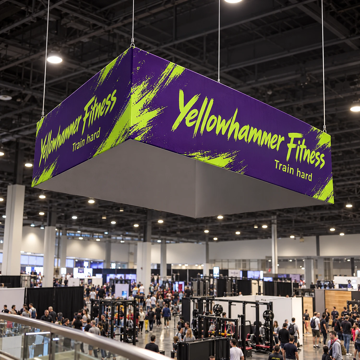 Square hanging fabric structure hanging above a busy trade show floor