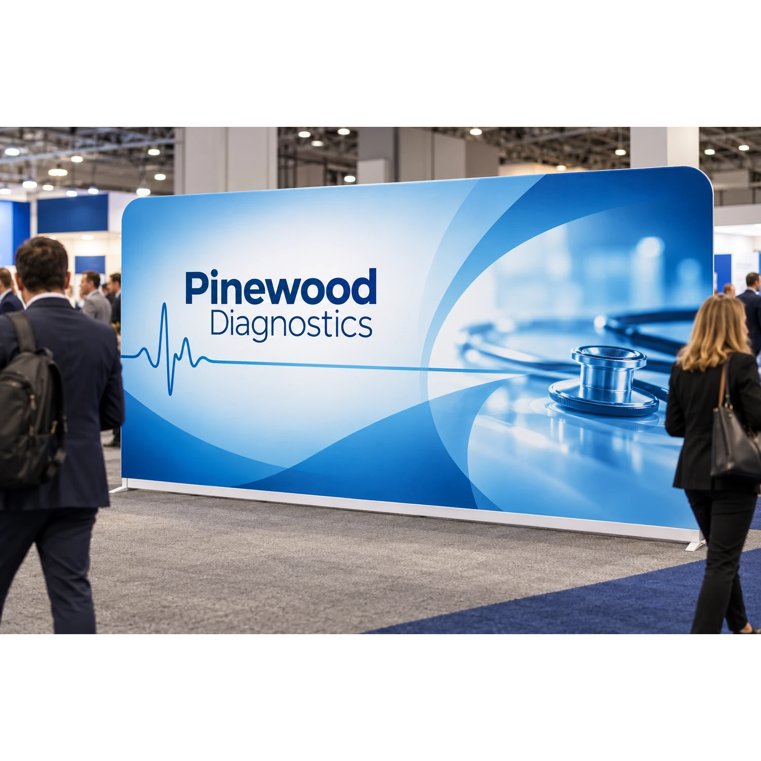 Straight fabric display wall in use at a busy trade show