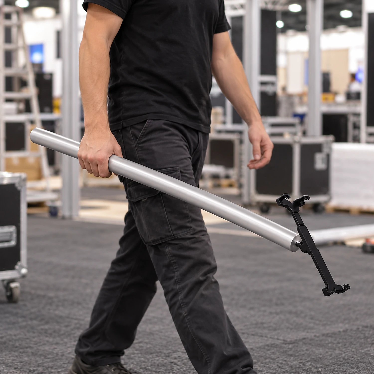 Tablet holder carried across an exhibition hall during build-up