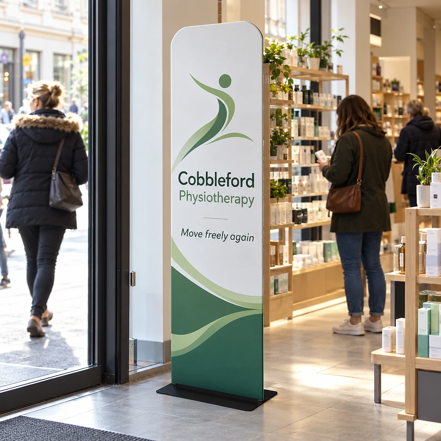Tension Banner in a high-street shop, shown with an example design