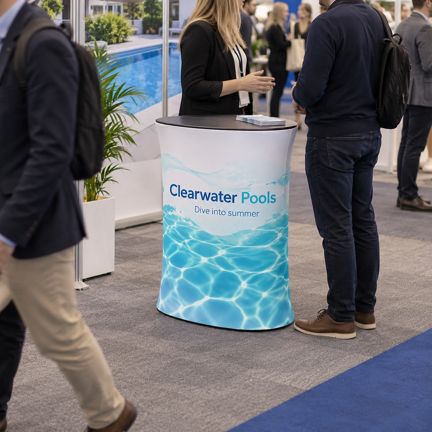 WaveLine Counter S fabric display counter at a trade show, shown with an example design