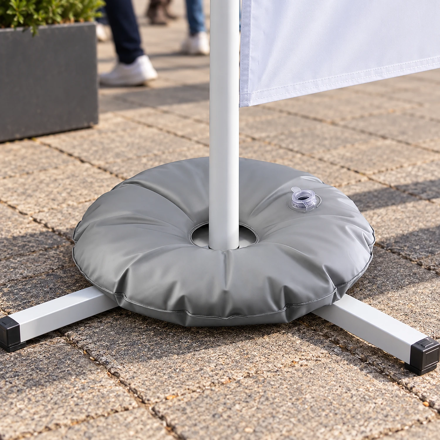 Close view of the water ring weight on a flag cross base