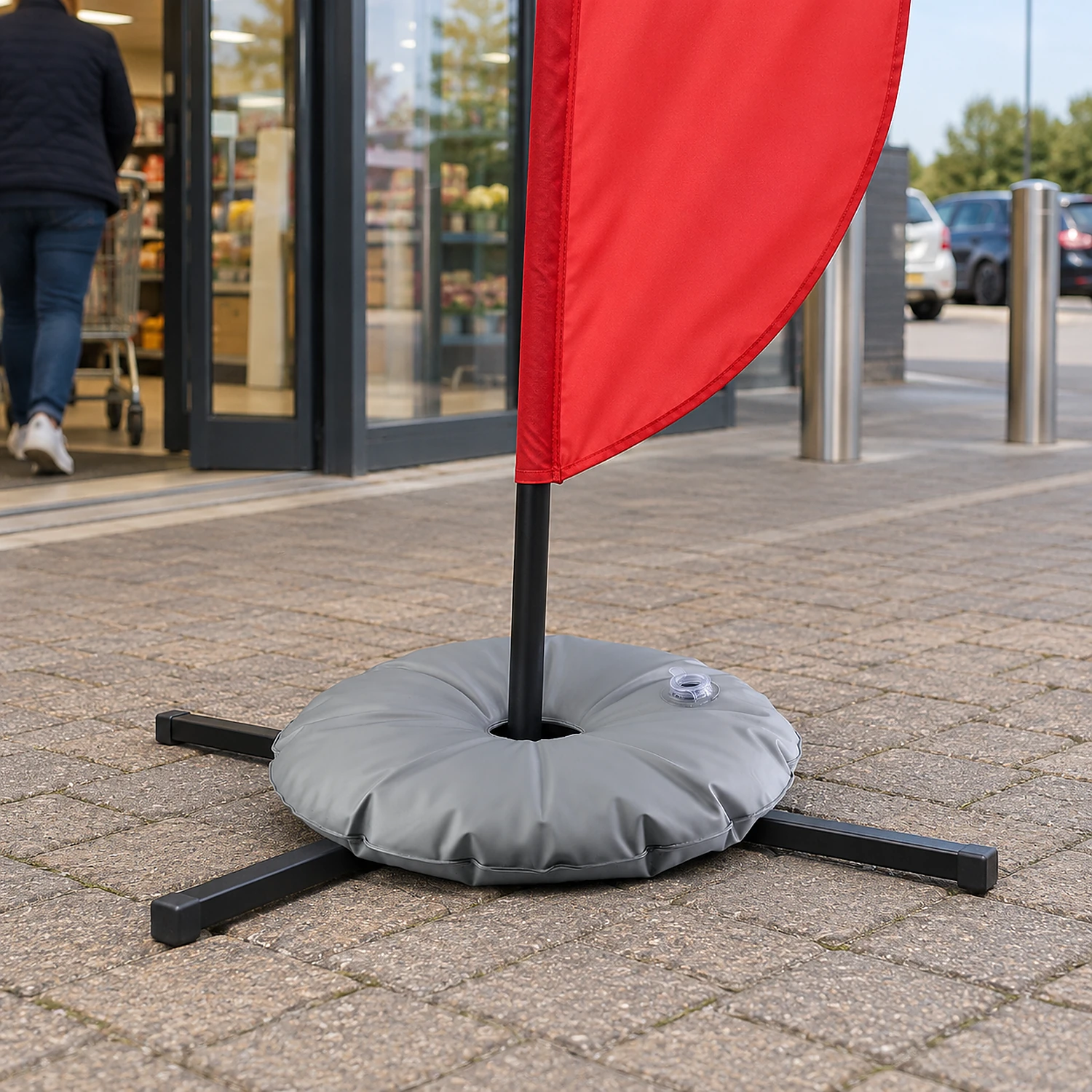 Water ring weight on a feather flag base