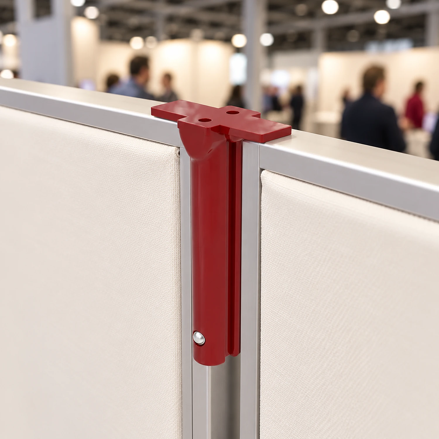 Red 2-way connector linking two frames standing side by side