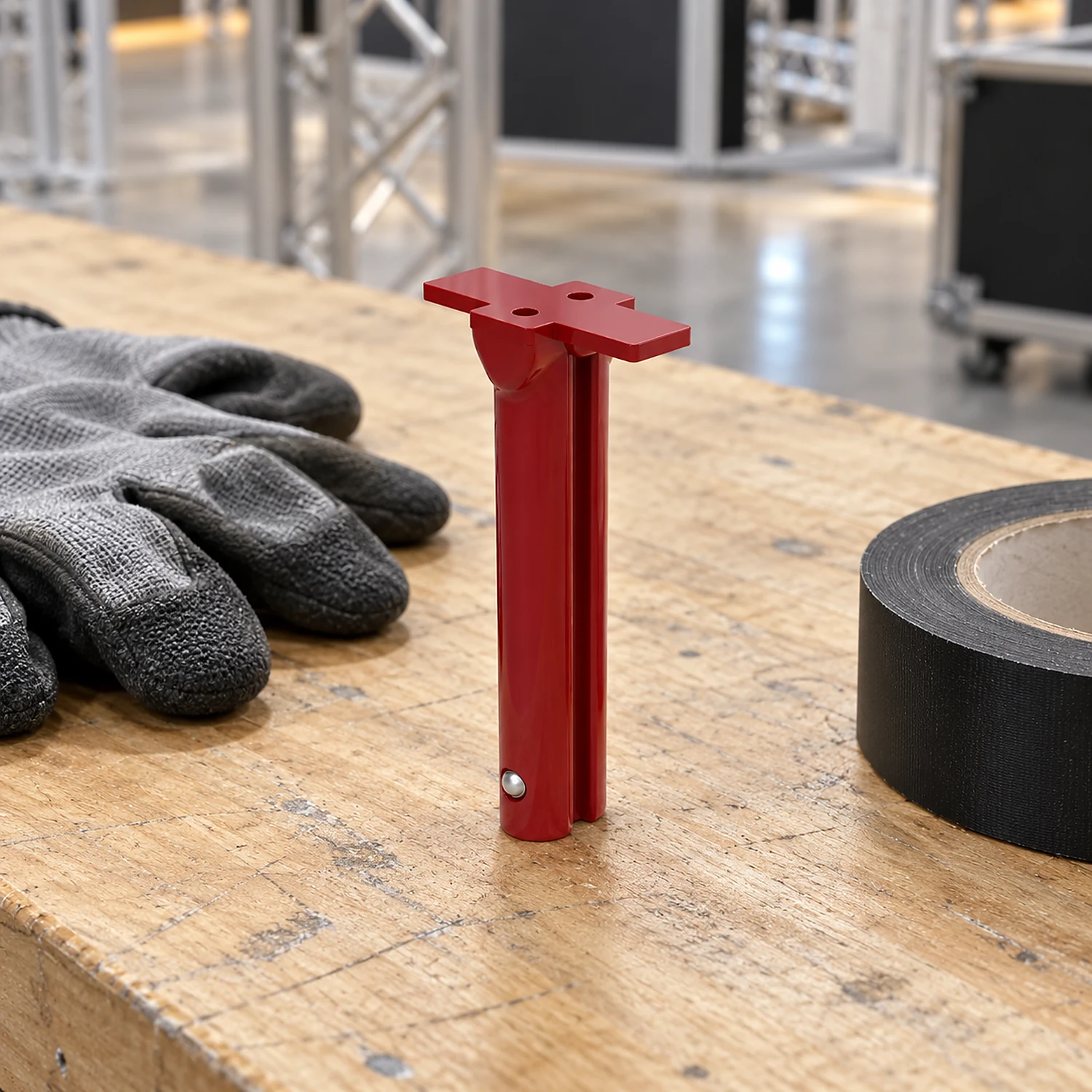 Red 2-way frame connector on a workbench