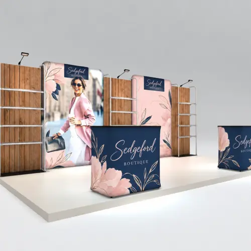 3m x 6m Exhibition Stand Kit with 2 Counters, 12 Shelves & LED Lights, shown with example artwork