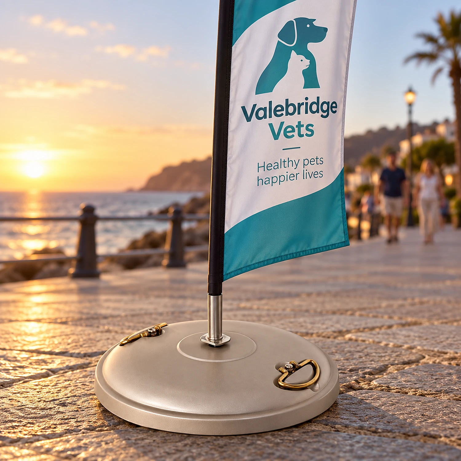 Concrete flag base holding a large feather flag on a promenade