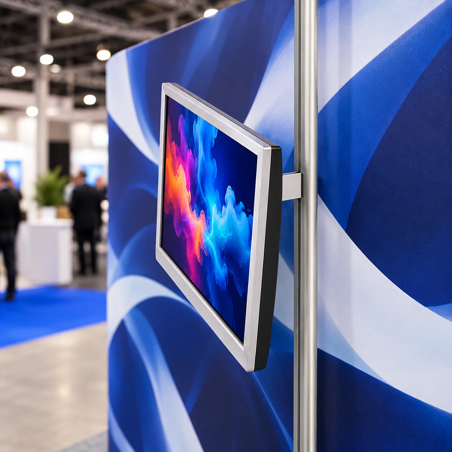 Screen mount holding a screen on a curved pop up backwall at a trade show