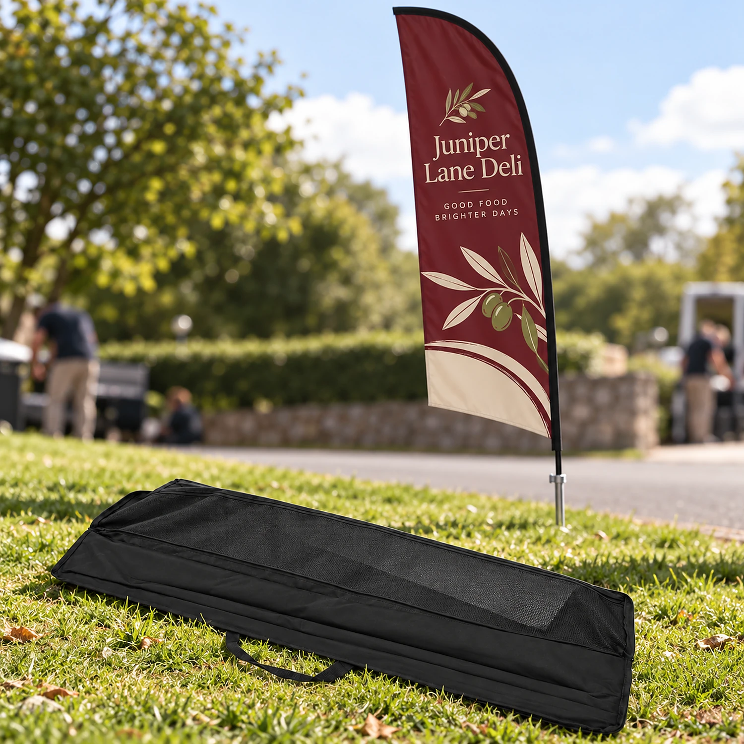 Flag carry bag on the grass beside a flag just put up