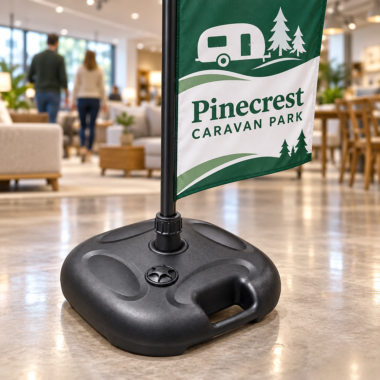 Basic parasol flag base holding a feather flag in a showroom