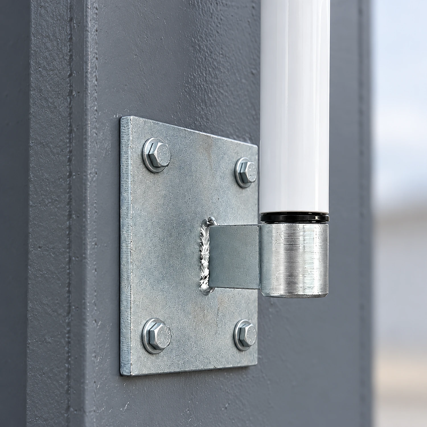 Straight wall mount bolted to a steel column with a pole fitted
