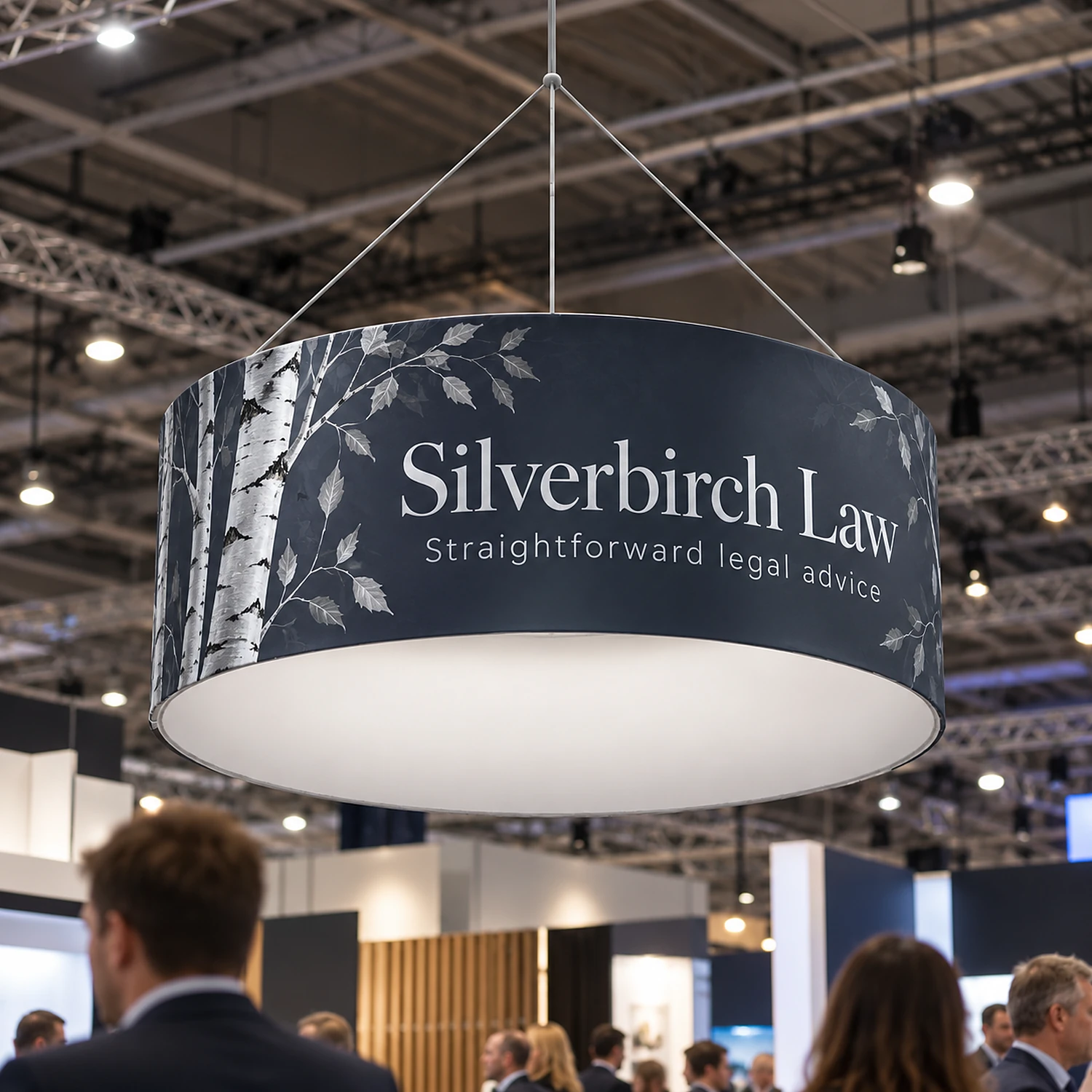 Formulate Circular Hanging Banner in use at a business expo