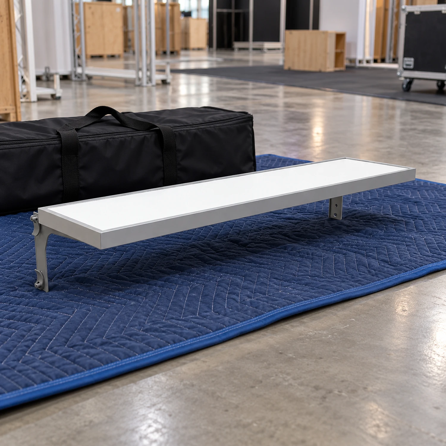 Frame shelf with its brackets on a moving blanket