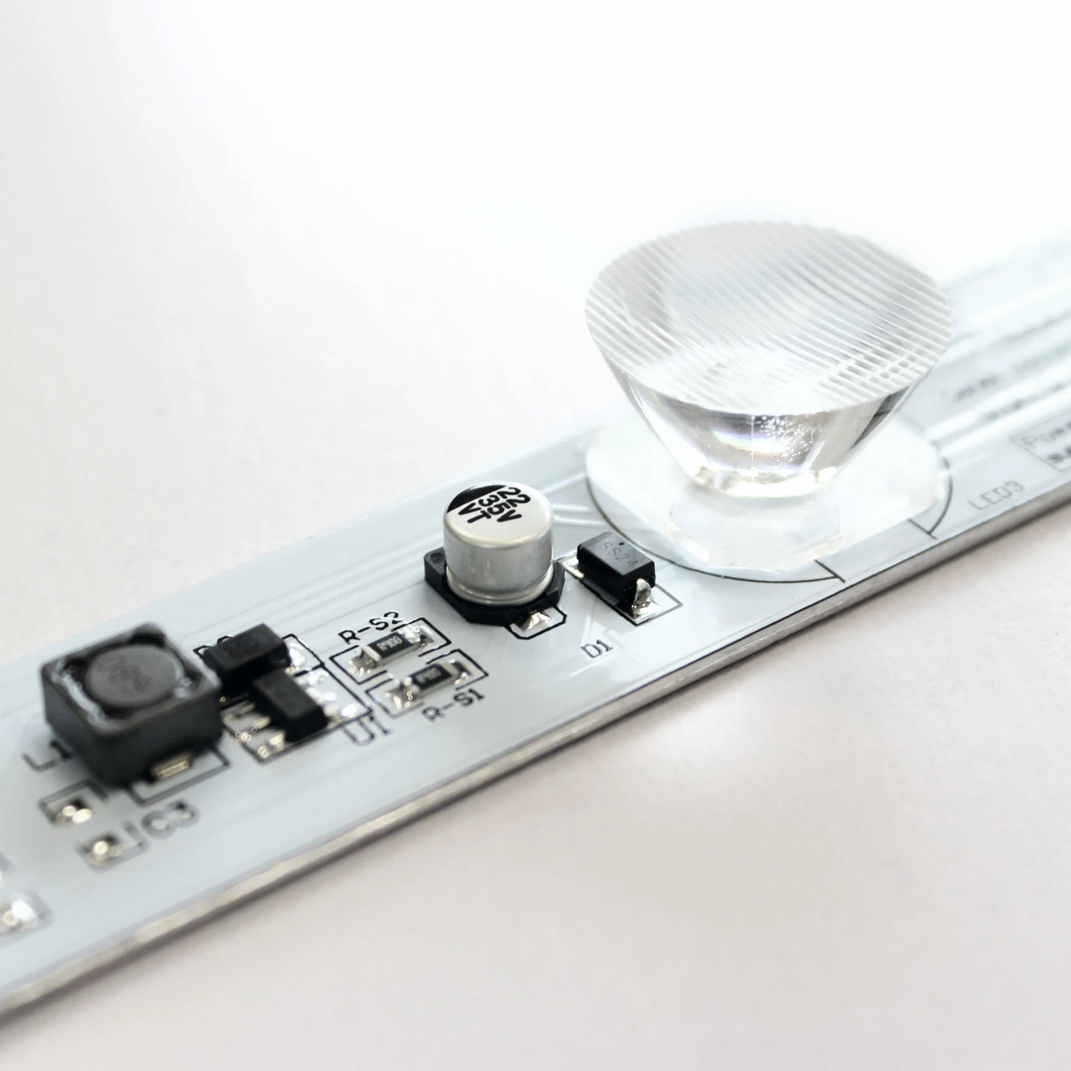 LED strip with lens optics inside the lightbox frame