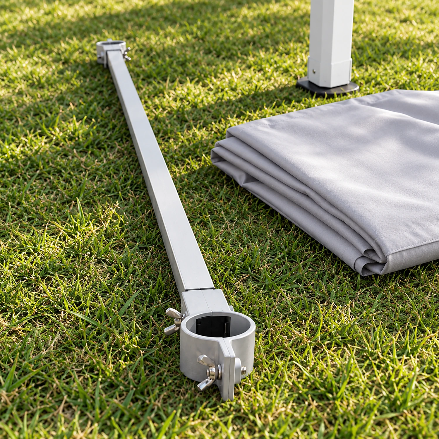 Half wall mounting bar on the grass during gazebo set-up