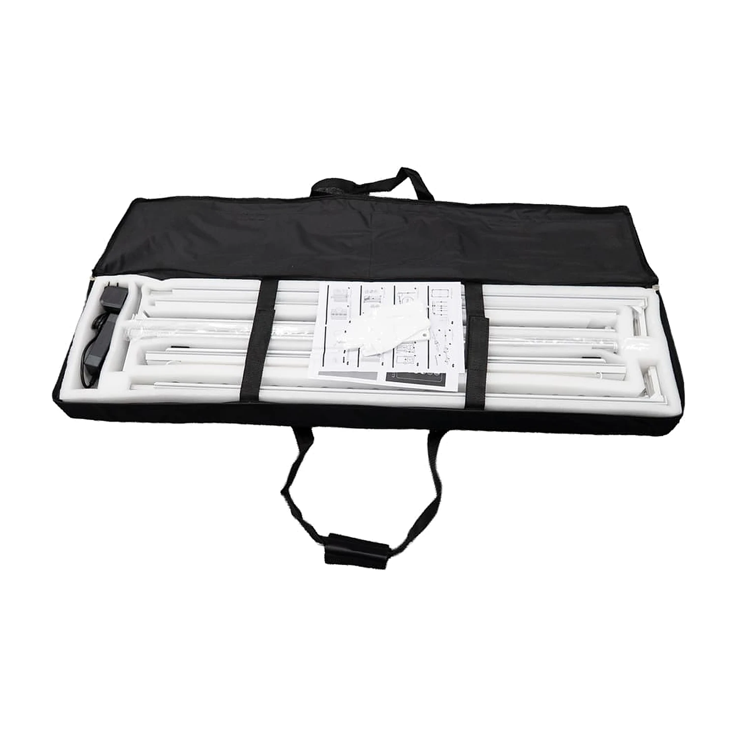 Wheeled carry bag opened with the white frame profiles and LED power unit in foam inserts
