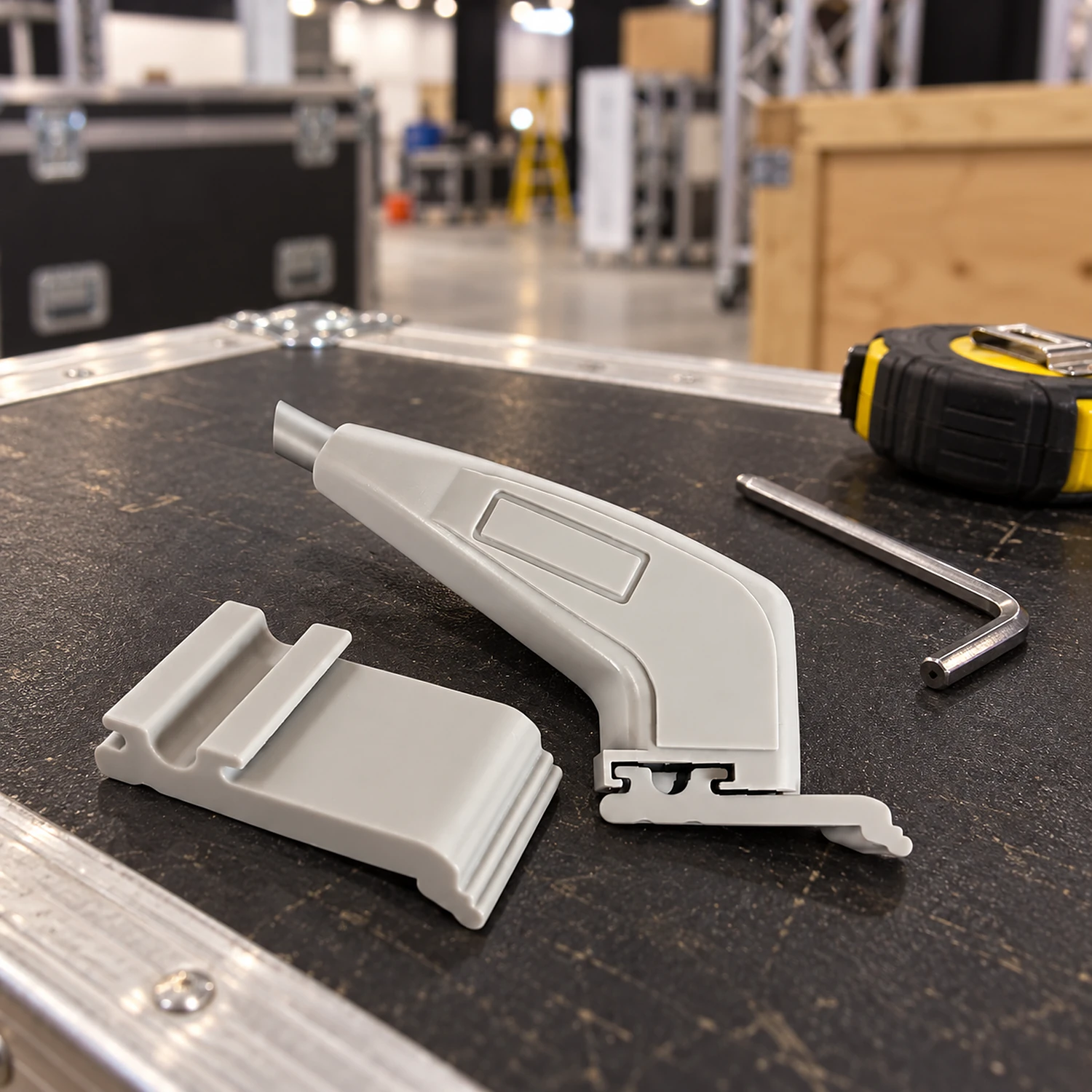 Light fitting parts on a flight case lid during stand build-up