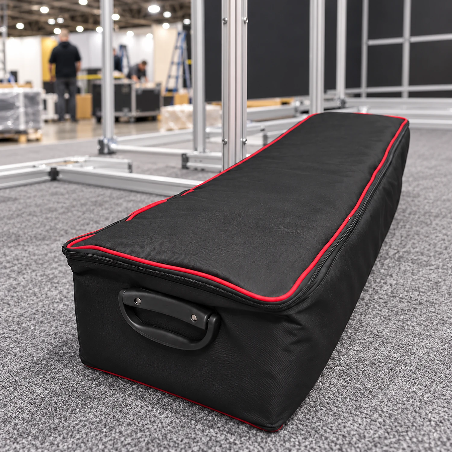 Modular frame carry bag beside a stand being built
