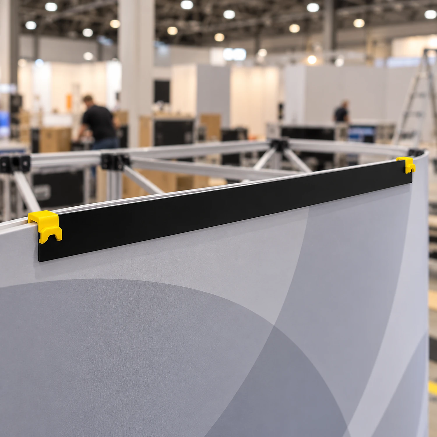 Rear curved hanger along the top of a pop up graphic panel