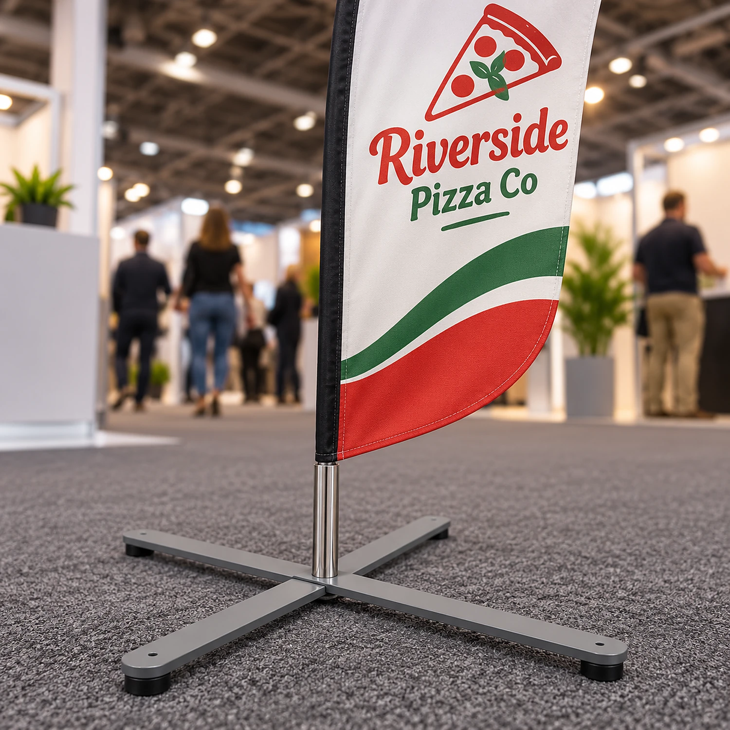 Small cross base holding an extra small flag on an exhibition stand