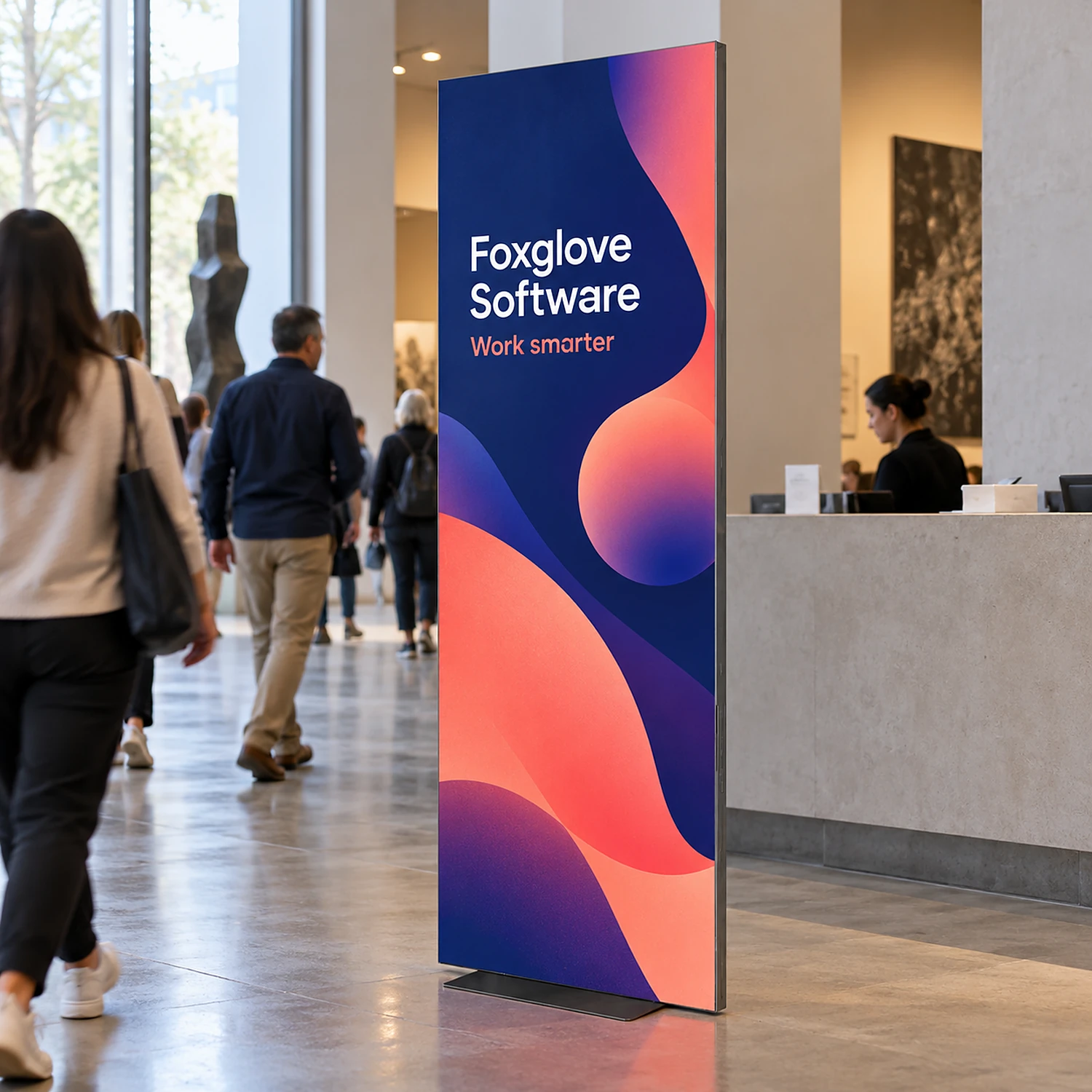 Framed fabric display totem in a gallery foyer