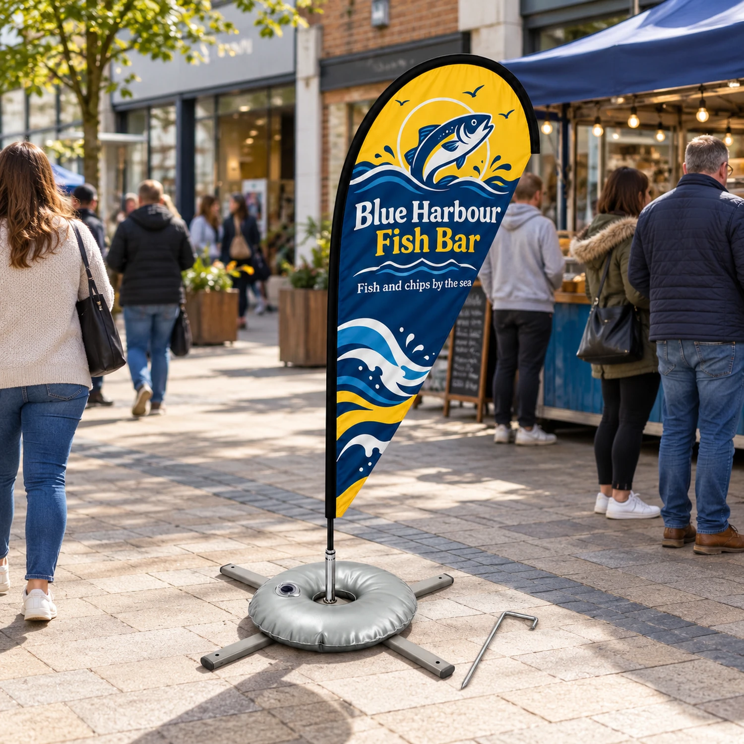 Zoom+ Quill Flag Set with Cross Base and Weight Ring in use at an event